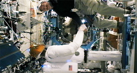 Greetings, Human! Space Robot Shakes Astronaut's Hand, Signs 'Hello'